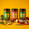 Bichu Buti Fiddlehead Fern Pickle, Apple Cinnamon Preserve, and Hot Chilli Chutney jars